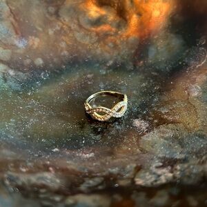 Ring by Stella and Dot Elegant Gold Infinity 
Size 6